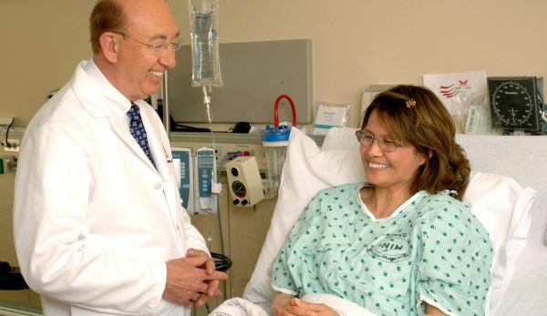 Patient and doctor in hospital room